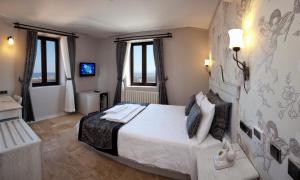 Postelja oz. postelje v sobi nastanitve Assos Behram Special Class Hotel Adults Only