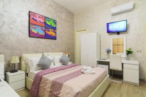 Letto o letti in una camera di Rome Place