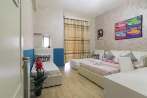 Letto o letti in una camera di Rome Place