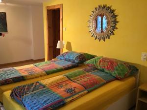 מיטה או מיטות בחדר ב-B&B Casa Moni