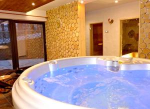 Fotografia z galérie ubytovania APARTAMENT SKANDYNAWSKI 2-poziomowy SAUNA JACUZZI v destinácii Szczyrk + 25 fotografií