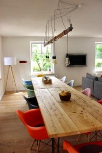 TV a/nebo společenská místnost v ubytování Ferienhaus Holy Home