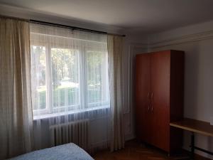Posteľ alebo postele v izbe v ubytovaní Kuckó Apartman Berente