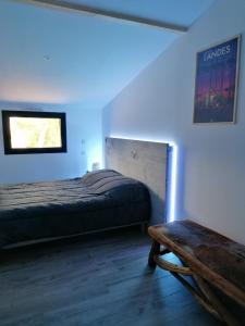 Ένα ή περισσότερα κρεβάτια σε δωμάτιο στο La VILLA OCEAN AVEC SPA et PISCINE - Les GITES DE CAMPARAN +28 φωτογραφίες