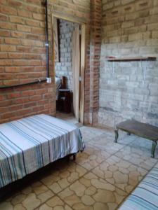 Postel nebo postele na pokoji v ubytování Chalé Rústico