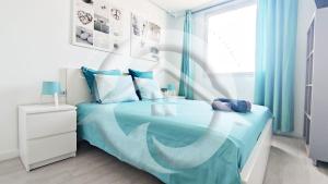 Ένα ή περισσότερα κρεβάτια σε δωμάτιο στο Paradise Ocean Suite +118 φωτογραφίες