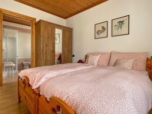 Voodi või voodid majutusasutuse Casa Cadore toas