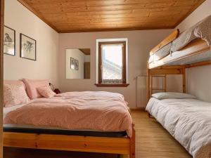 Voodi või voodid majutusasutuse Casa Cadore toas