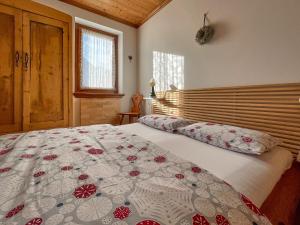 Voodi või voodid majutusasutuse Casa Cadore toas