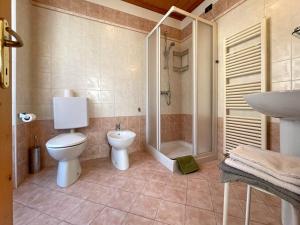 Vannituba majutusasutuses Casa Cadore