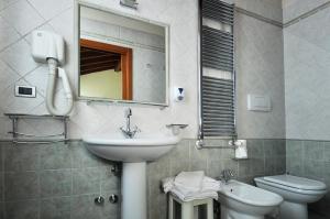 Koupelna v ubytování Locanda Baraca