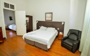 Postel nebo postele na pokoji v ubytování Palace Hotel de Caxambu
