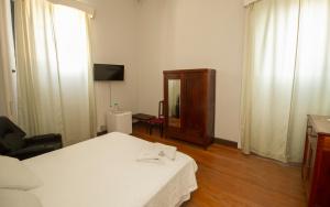 TV a/nebo společenská místnost v ubytování Palace Hotel de Caxambu