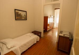 Postel nebo postele na pokoji v ubytování Palace Hotel de Caxambu