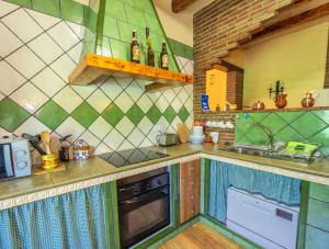 Kuchnia lub aneks kuchenny w obiekcie Cubo's Finca Jara