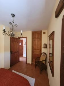 A bed or beds in a room at El Invernal de Picos