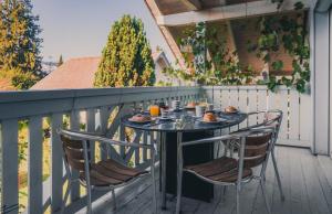 Balkón alebo terasa v ubytovaní Armonia Altach, 2-6 P, 2 Schlafzimmer, Küche, Parkplatz, Balkon, Wifi, Garten, Stellplatz für Ski