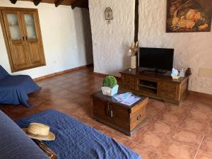 TV a/nebo společenská místnost v ubytování Casa rural las perez