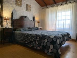 Postel nebo postele na pokoji v ubytování Casa rural las perez