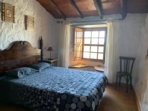 Postel nebo postele na pokoji v ubytování Casa rural las perez