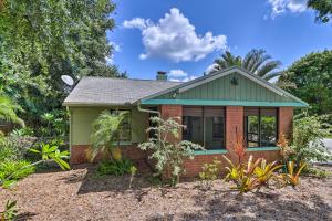 a small house in a garden at Vibrant Rockledge Home about 2 Mi to Cocoa Village! in Rockledge