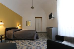 TV a/nebo společenská místnost v ubytování B&B ex Albergo Centrale ATESSA CENTRO