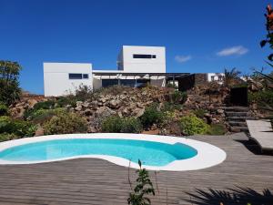 The swimming pool at or close to Private villa with pool in Lajares