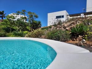 The swimming pool at or close to Private villa with pool in Lajares