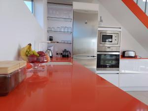 A kitchen or kitchenette at Private villa with pool in Lajares