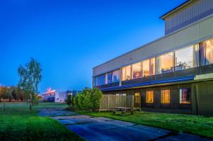 a building with a bench in front of it at Scandic Kalmar in Kalmar