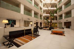 Area soggiorno di Avalon Courtyard Residence Suites