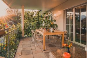 Balkón nebo terasa v ubytování Coraline -Koblach, 6-10 P, 3 Schlafzimmer, Küche, riesige Terrasse, Parkplatz, WiFi, Stellplatz Ski