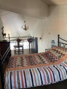 Кровать или кровати в номере Bord de mer