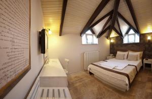 Postelja oz. postelje v sobi nastanitve Assos Behram Special Class Hotel Adults Only