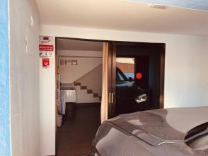 Ein Bett oder Betten in einem Zimmer der Unterkunft VIVIENDA ÚNICA EN PRIMERA LÍNEA DE PLAYA
