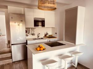 Küche/Küchenzeile in der Unterkunft VIVIENDA ÚNICA EN PRIMERA LÍNEA DE PLAYA