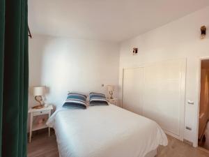 Ein Bett oder Betten in einem Zimmer der Unterkunft VIVIENDA ÚNICA EN PRIMERA LÍNEA DE PLAYA