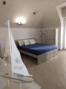 Ένα ή περισσότερα κρεβάτια σε δωμάτιο στο FOUR WHITE APARTMENTS