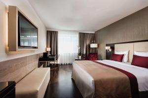 Posteľ alebo postele v izbe v ubytovaní Wyndham Grand Salzburg Conference Centre