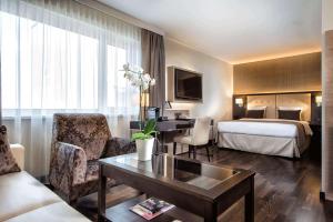 Posteľ alebo postele v izbe v ubytovaní Wyndham Grand Salzburg Conference Centre