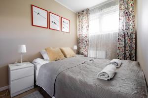 Posteľ alebo postele v izbe v ubytovaní Apartament Renatek Centrum Zakopane