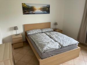 Postel nebo postele na pokoji v ubytování Apartment Mühlbach
