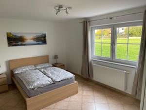 Postel nebo postele na pokoji v ubytování Apartment Mühlbach