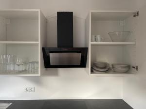 Kuchyň nebo kuchyňský kout v ubytování Apartment Mühlbach