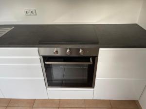 Kuchyň nebo kuchyňský kout v ubytování Apartment Mühlbach