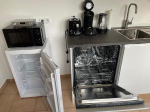 Kuchyň nebo kuchyňský kout v ubytování Apartment Mühlbach