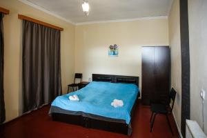 Postel nebo postele na pokoji v ubytování Guest House Iaraji