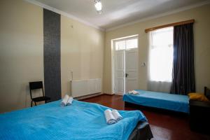 Postel nebo postele na pokoji v ubytování Guest House Iaraji