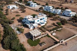 an aerial view of a house in a village at Ammoudia Studios in Agiassos