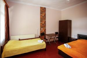 Postel nebo postele na pokoji v ubytování Guest House Iaraji